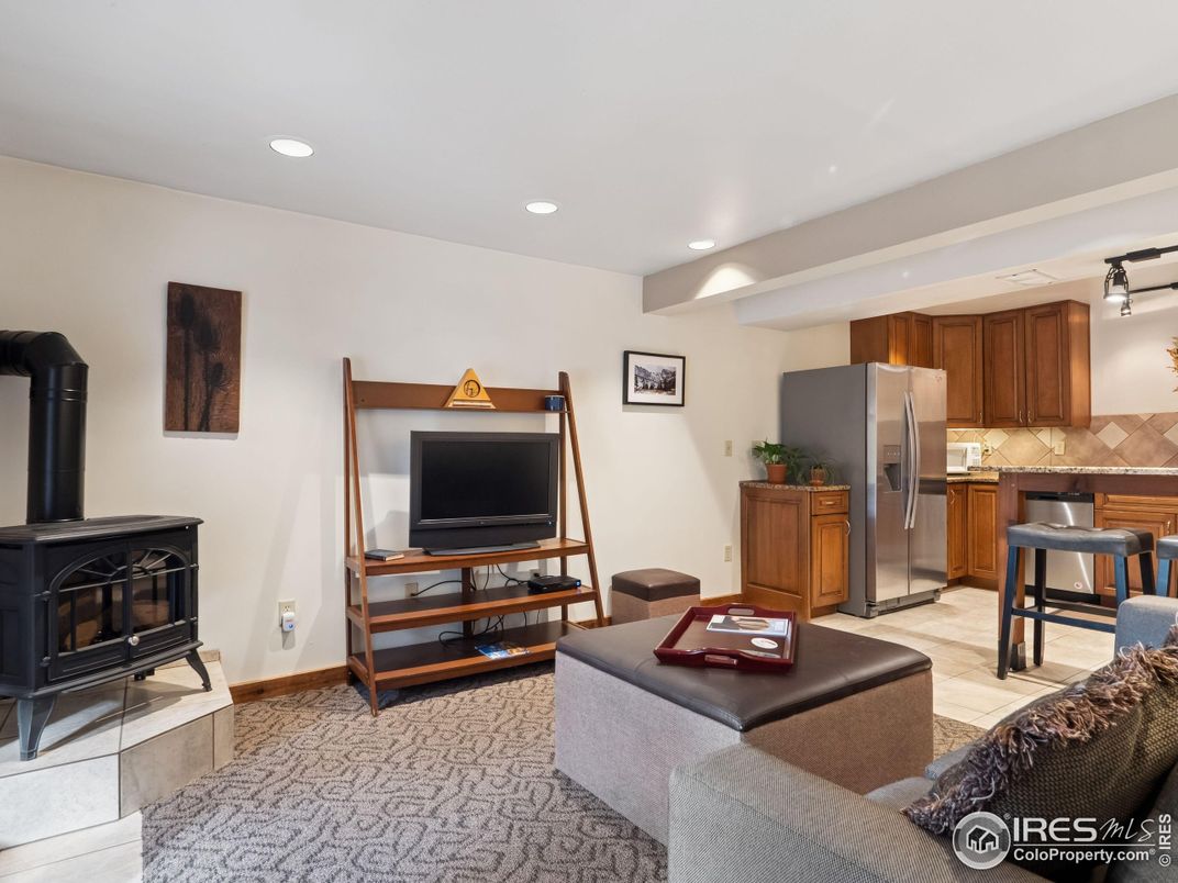 Fireplace, Interior, Kitchen, Living room, Recessed Lighting, Stainless Steel Appliances