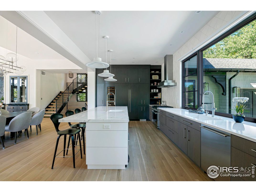 Dining room, Interior, Kitchen, Pendant Lights, Recessed Lighting, Stainless Steel Appliances, Wood Texture Flooring