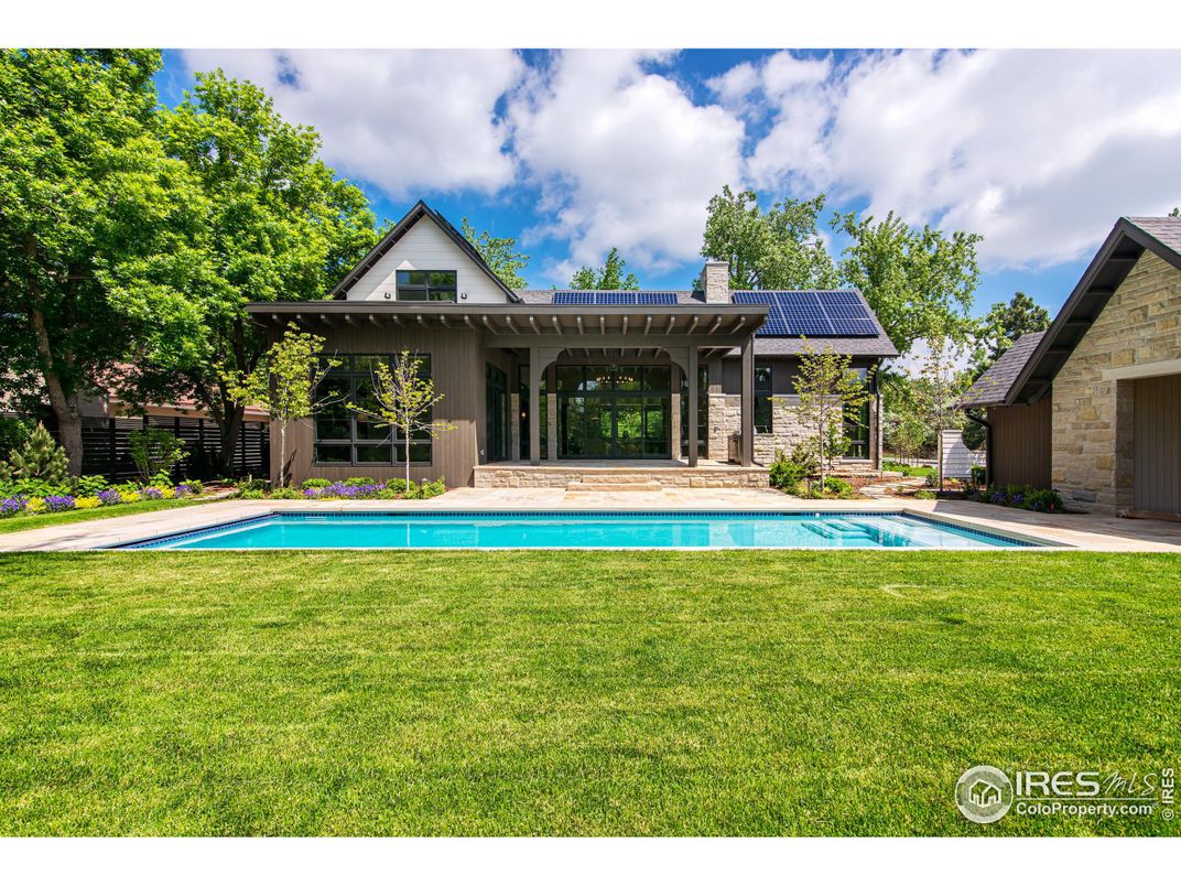 Exterior, Pool, Solar Panels