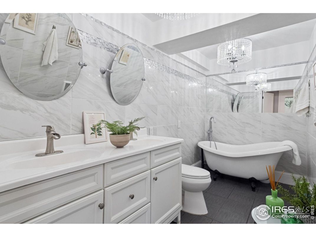 Bathroom, Chandelier, Dual Sink Vanities, Free Standing Baths, Interior, Marble Walls