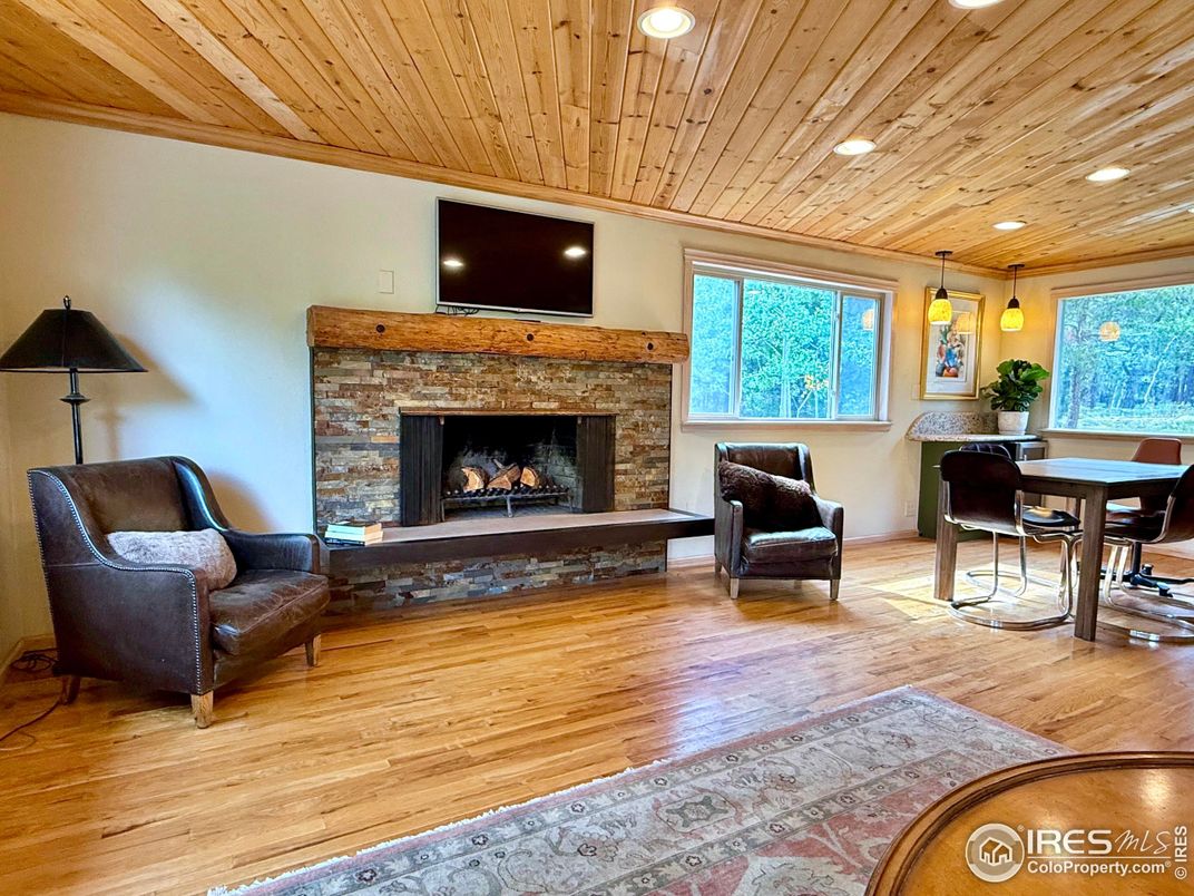 Dining room, Fireplace, Interior, Pendant Lights, Recessed Lighting, Wooden Ceilings, Wood Texture Flooring