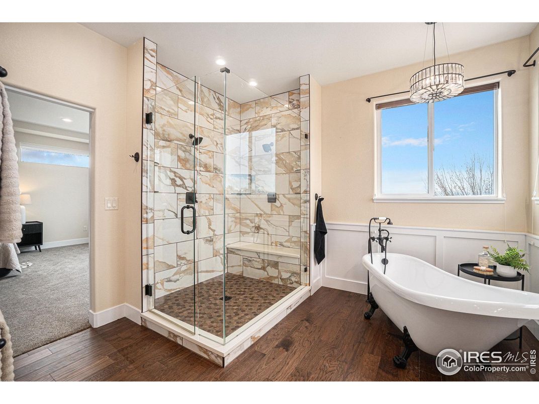 Bathroom, Free Standing Baths, Glass Shower, Interior, Pendant Lights, Recessed Lighting, Wood Texture Flooring