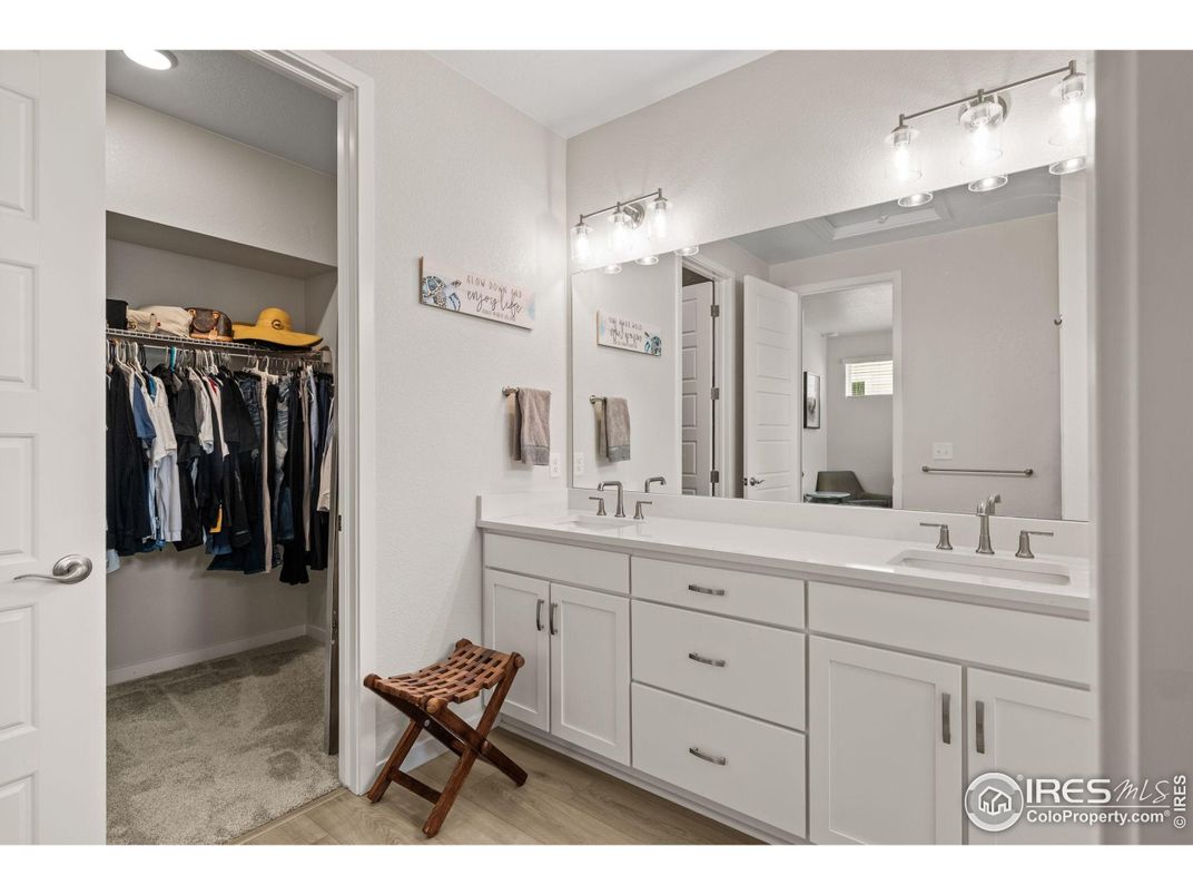 Bathroom, Dual Sink Vanities, Interior, Recessed Lighting, Walk-in Closets, Wood Texture Flooring