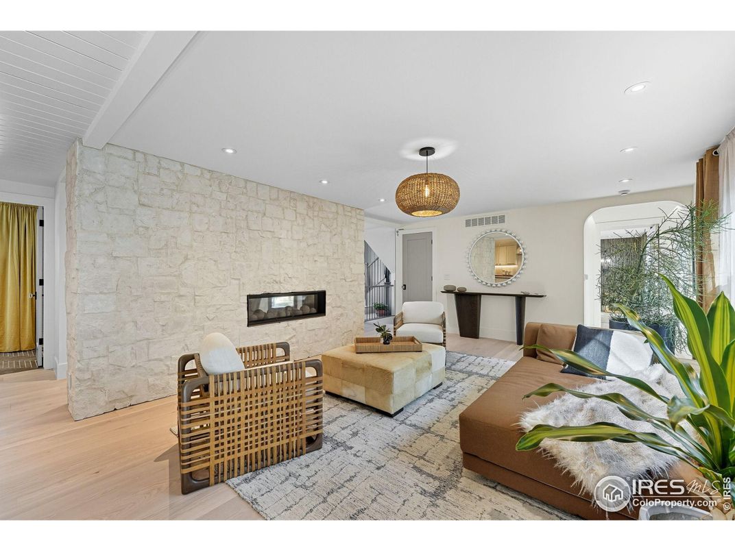 Fireplace, Interior, Living room, Recessed Lighting, Stone Walls, Wood Texture Flooring