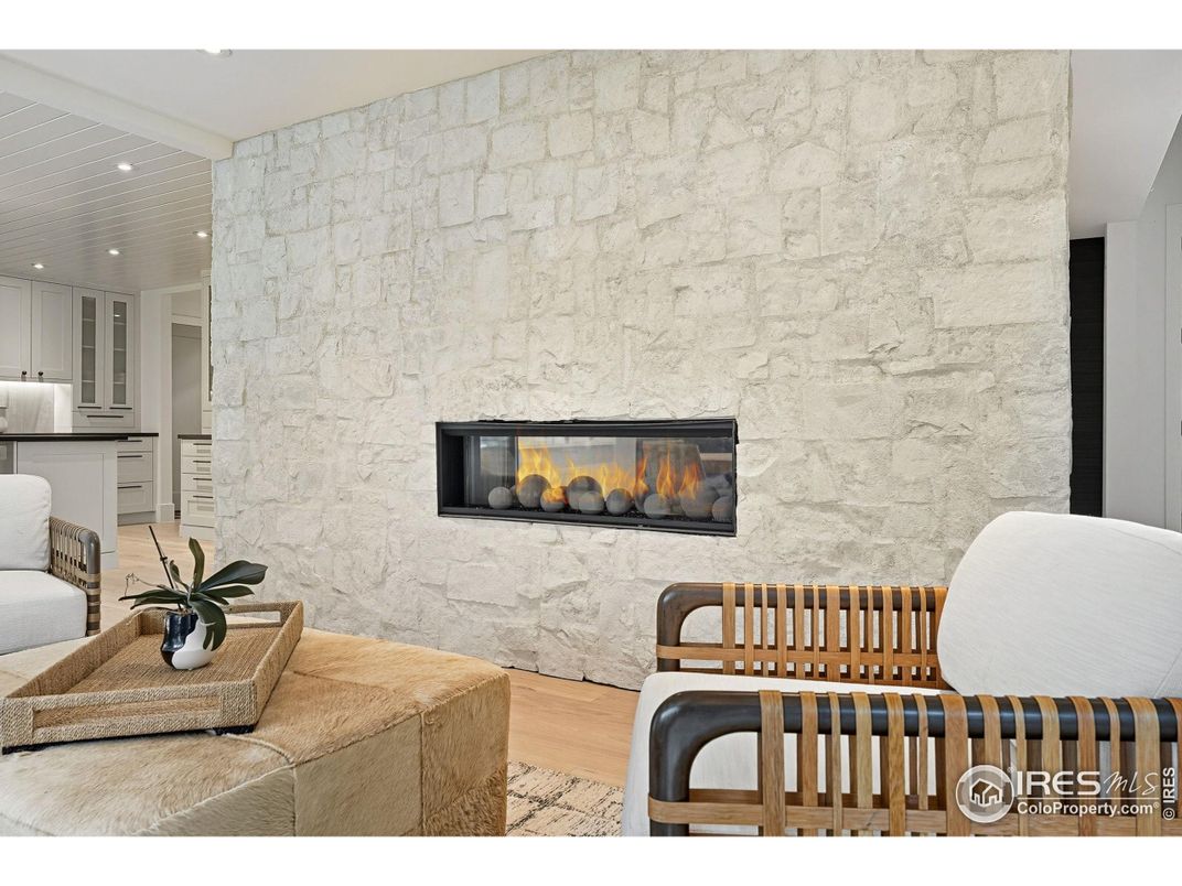 Fireplace, Interior, Kitchen, Living room, Recessed Lighting, Stone Walls, Wood Texture Flooring