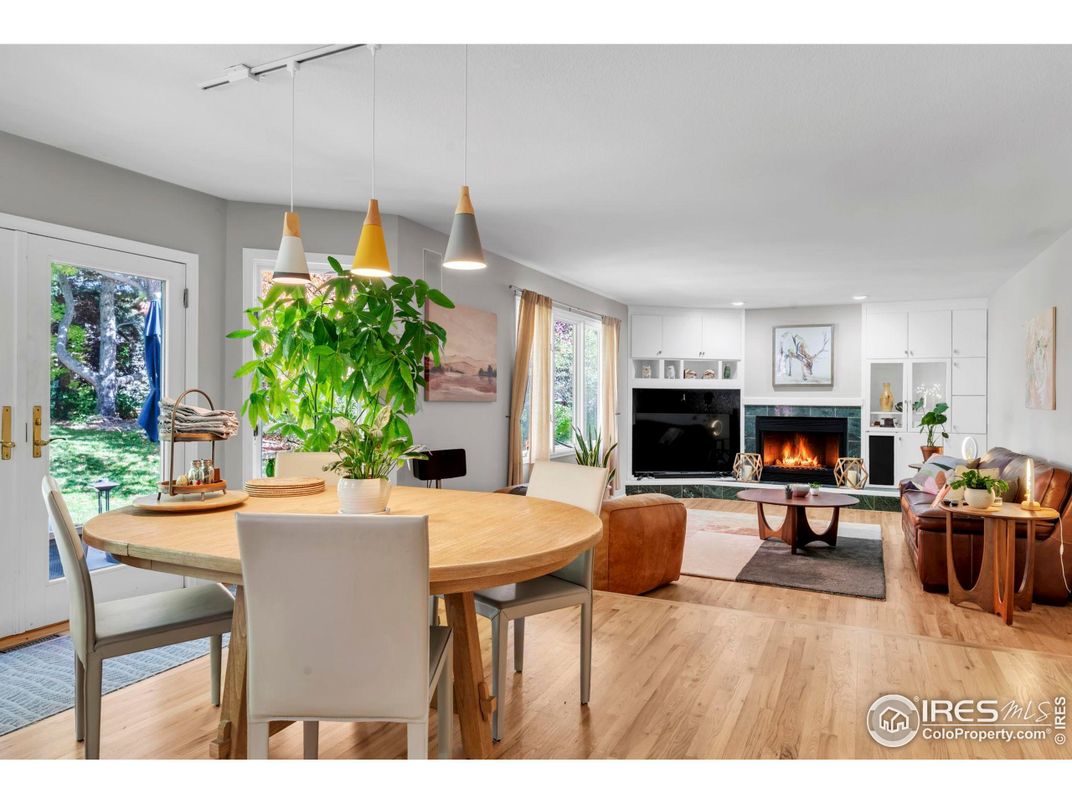 Dining room, Fireplace, Interior, Living room, Pendant Lights, Recessed Lighting, Wood Texture Flooring