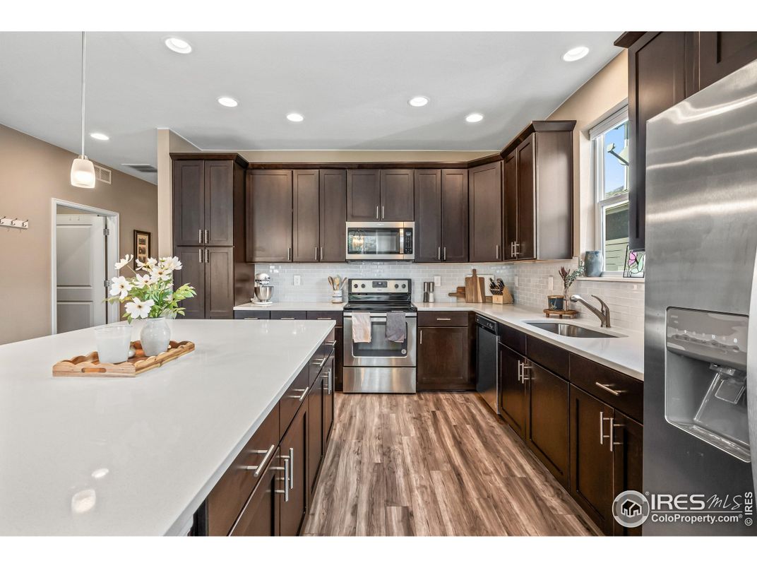 Interior, Kitchen, Pendant Lights, Recessed Lighting, Stainless Steel Appliances, Wood Texture Flooring