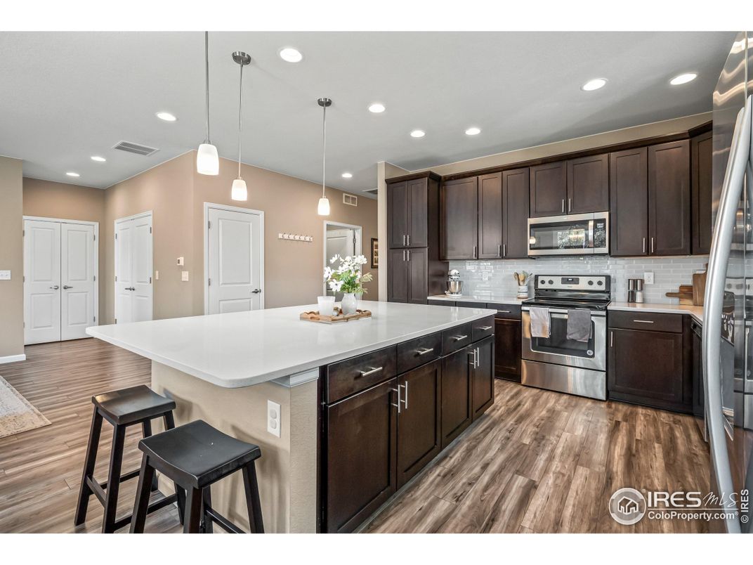 Interior, Kitchen, Pendant Lights, Recessed Lighting, Stainless Steel Appliances, Wood Texture Flooring