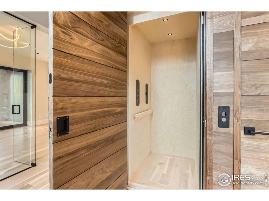 Elevator, Interior, Recessed Lighting, Wood Texture Flooring, Wooden Walls