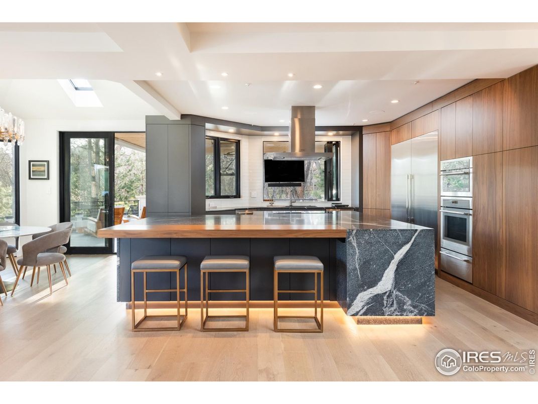 Chandelier, Dining room, Interior, Kitchen, Recessed Lighting, Stainless Steel Appliances, Wood Texture Flooring