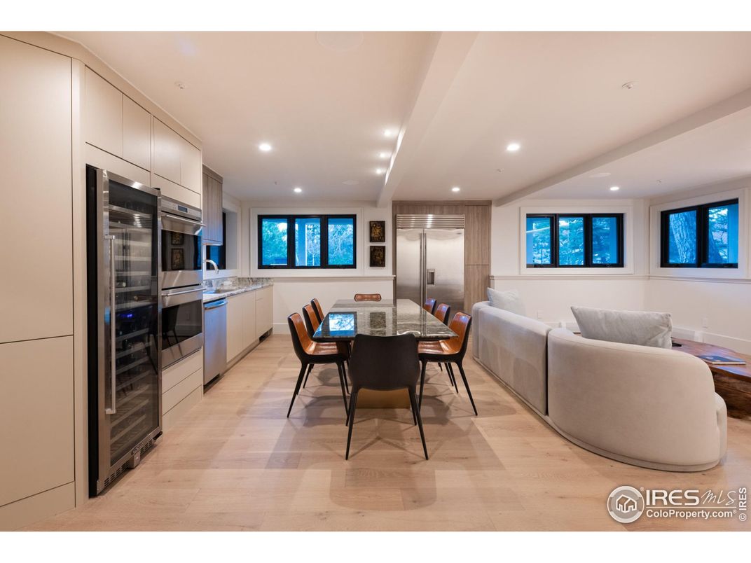 Dining room, Interior, Kitchen, Living room, Recessed Lighting, Stainless Steel Appliances, Wood Texture Flooring