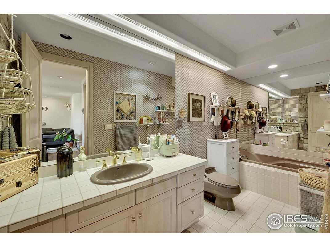 Bathroom, Dual Sink Vanities, Interior, Recessed Lighting, Tile Countertops