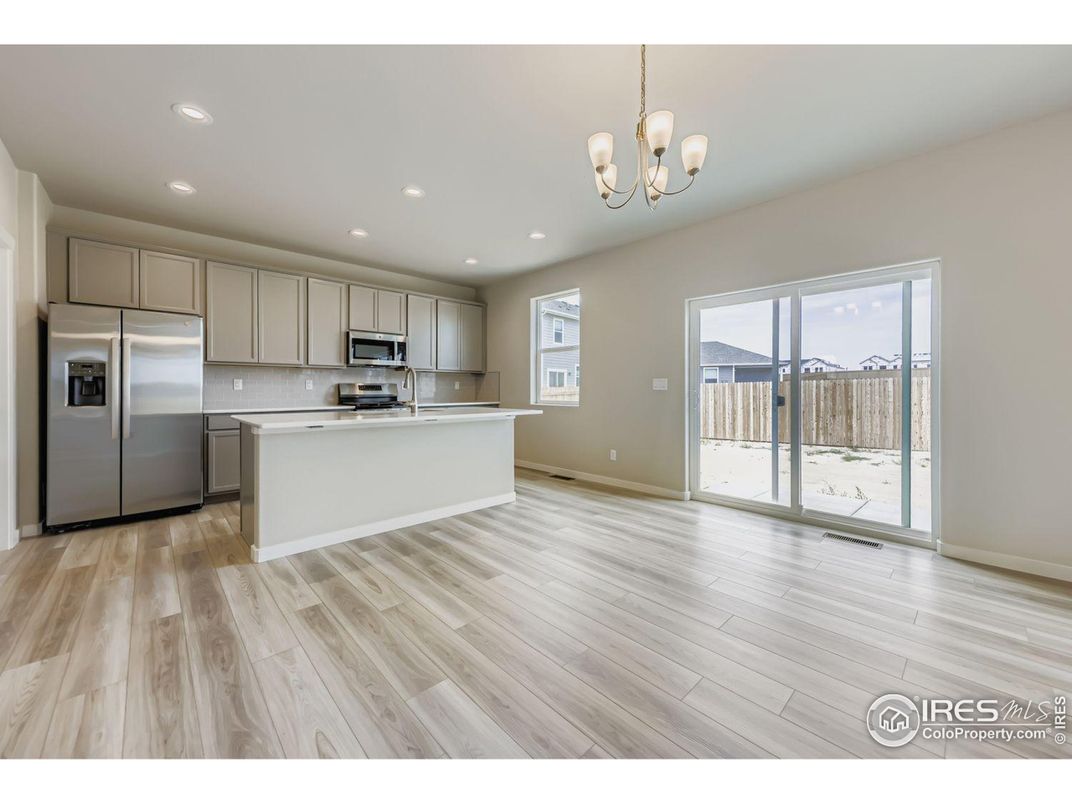 Chandelier, Interior, Kitchen, Recessed Lighting, Stainless Steel Appliances, Wood Texture Flooring