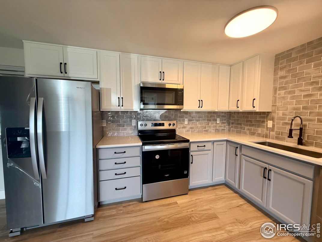 Interior, Kitchen, Stainless Steel Appliances, Stone Walls, Wood Texture Flooring