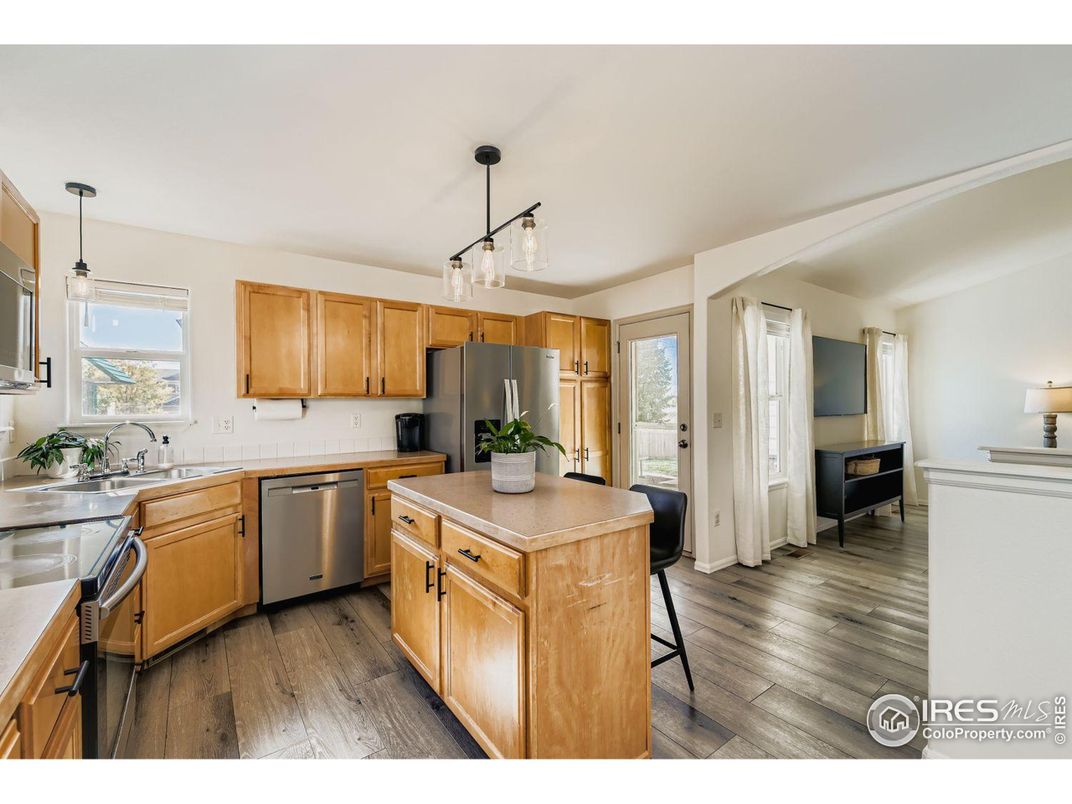 Interior, Kitchen, Pendant Lights, Stainless Steel Appliances, Wood Texture Flooring