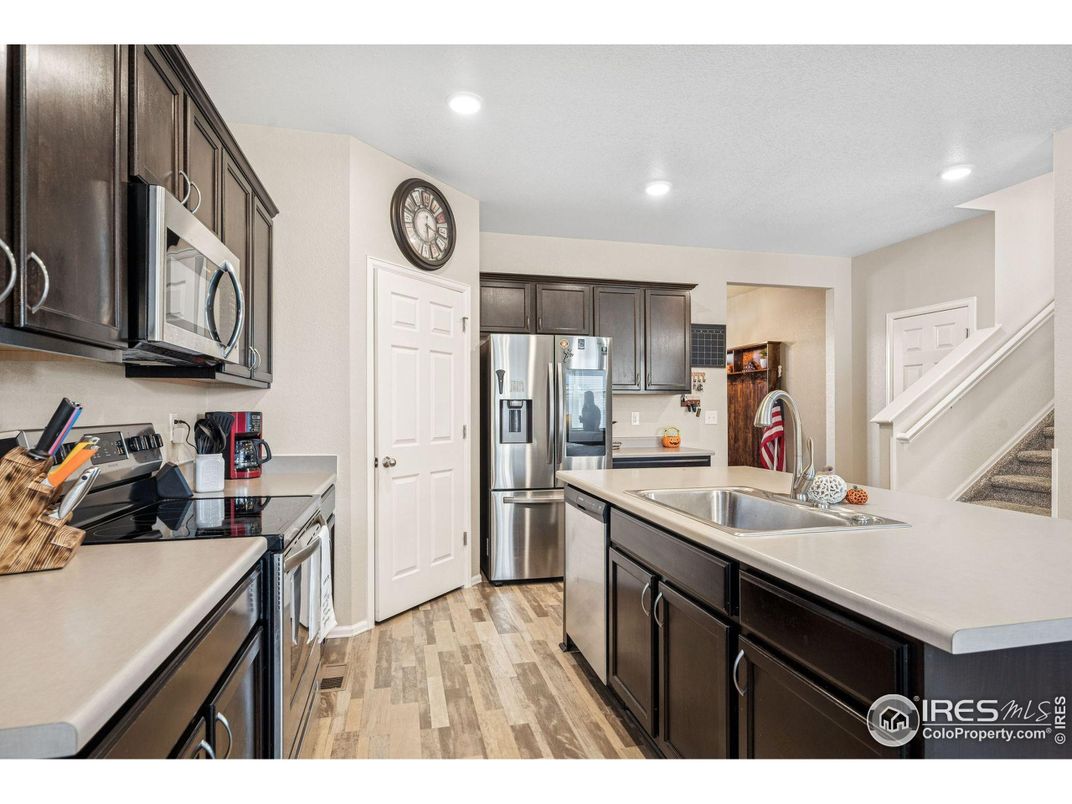 Interior, Kitchen, Recessed Lighting, Stainless Steel Appliances, Wood Texture Flooring