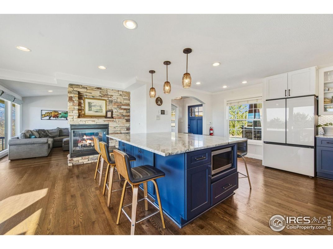 Fireplace, Interior, Kitchen, Living room, Pendant Lights, Recessed Lighting, Stone Walls, Wood Texture Flooring