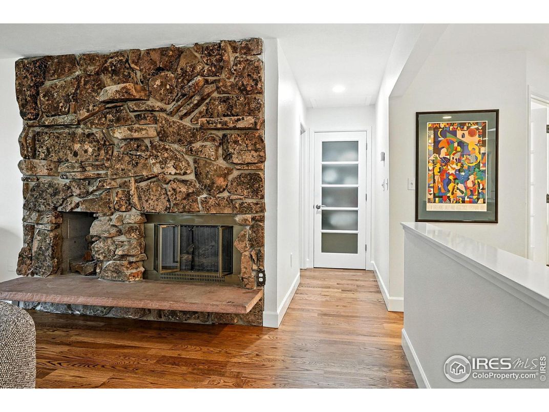 Fireplace, Interior, Recessed Lighting, Stone Walls, Wood Texture Flooring