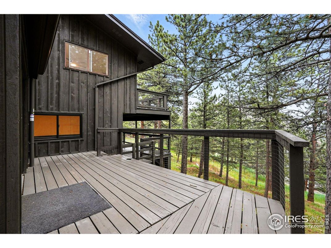 Fireplace, Interior, Living room, Recessed Lighting, Stone Walls, Wood Texture Flooring