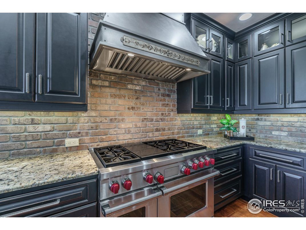 Interior, Kitchen, Recessed Lighting, Stainless Steel Appliances, Stone Walls, Wood Texture Flooring