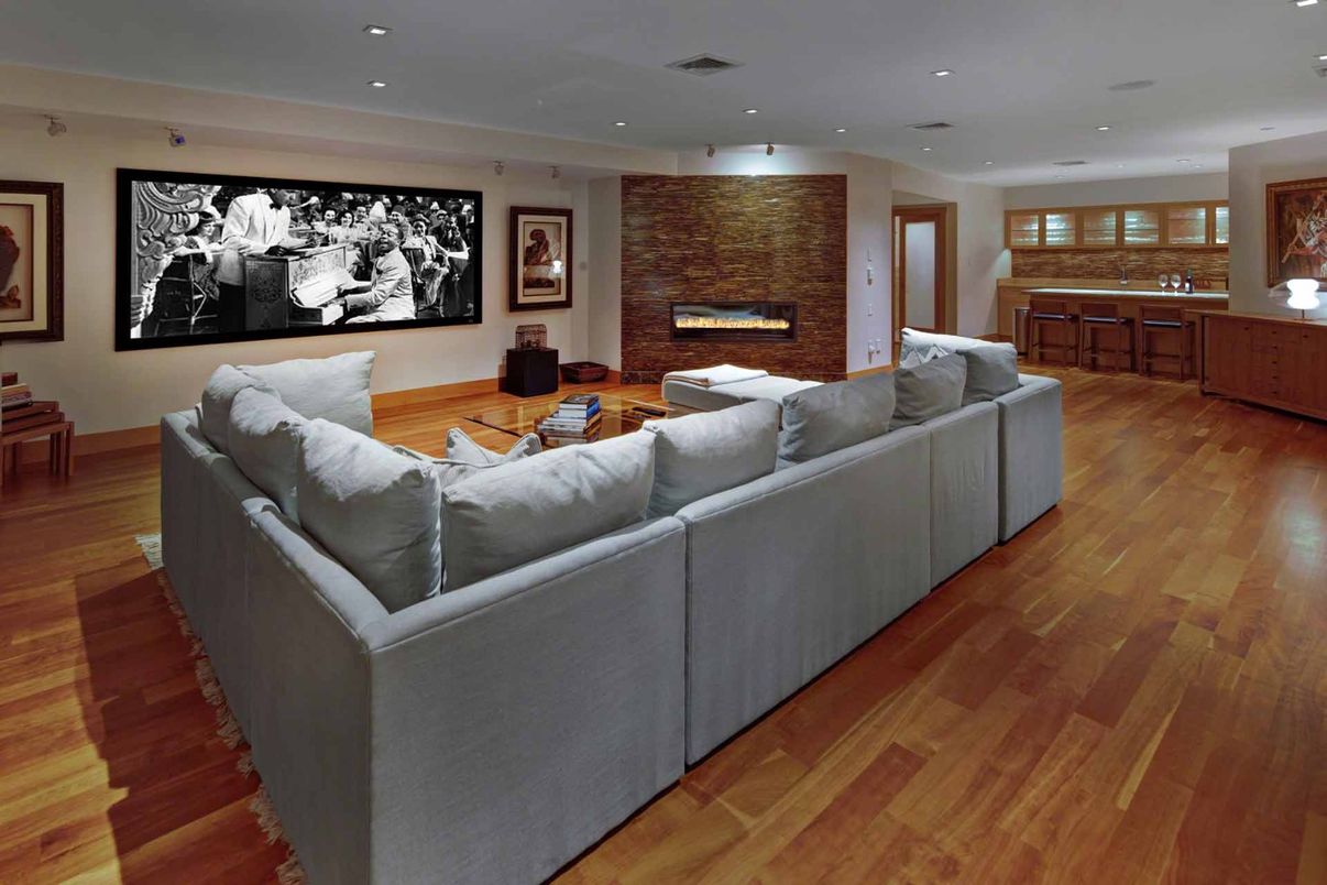 Fireplace, Interior, Living room, Recessed Lighting, Stone Walls, Wood Texture Flooring