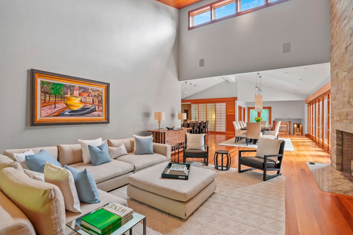 Dining room, Fireplace, Interior, Living room, Pendant Lights, Stone Walls, Wood Texture Flooring