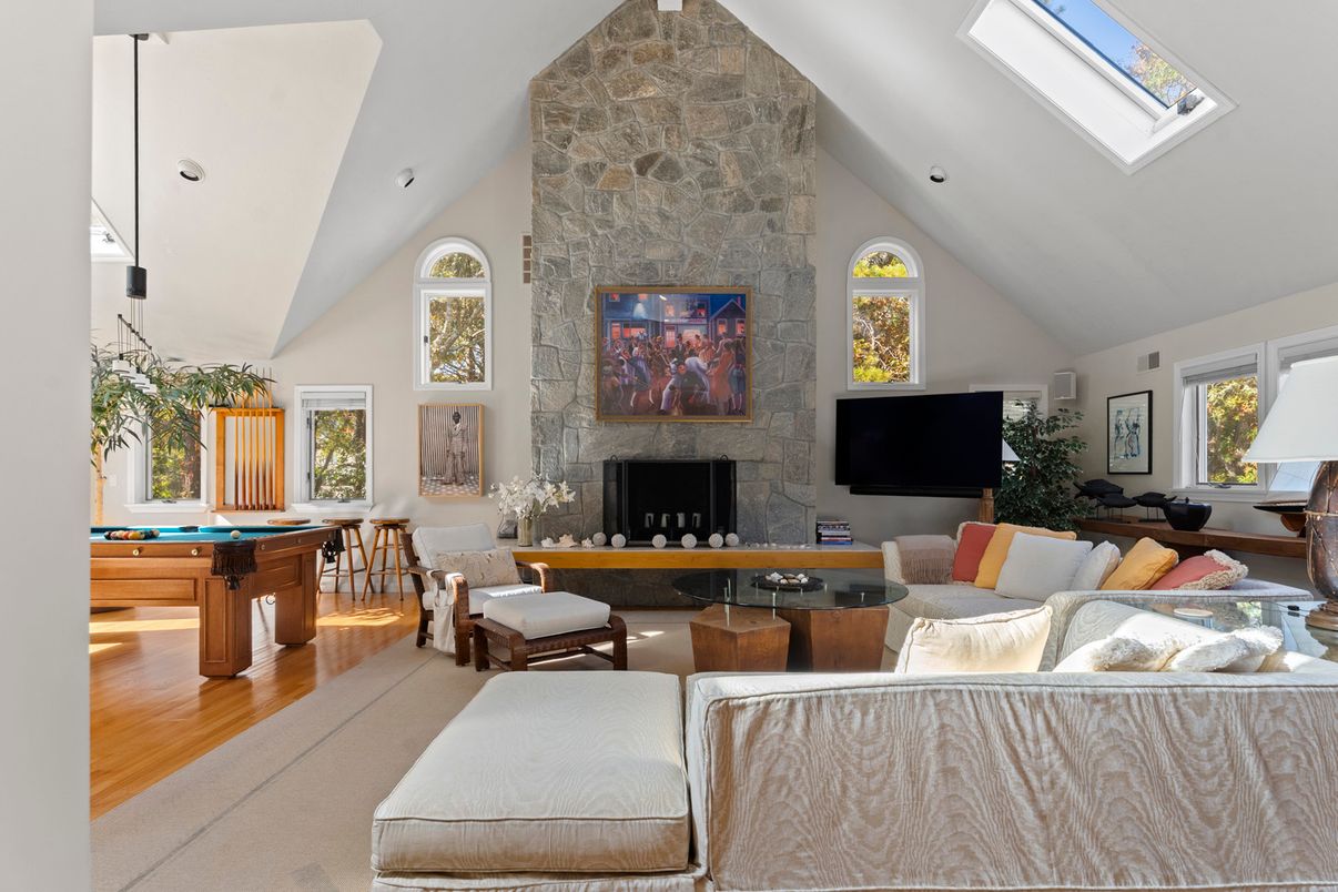 Fireplace, Game Room, Interior, Living room, Stone Walls, Wood Texture Flooring