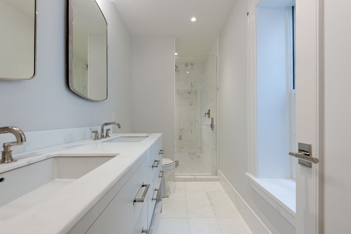 Bathroom, Dual Sink Vanities, Glass Shower, Interior, Marble, Marble Walls, Recessed Lighting