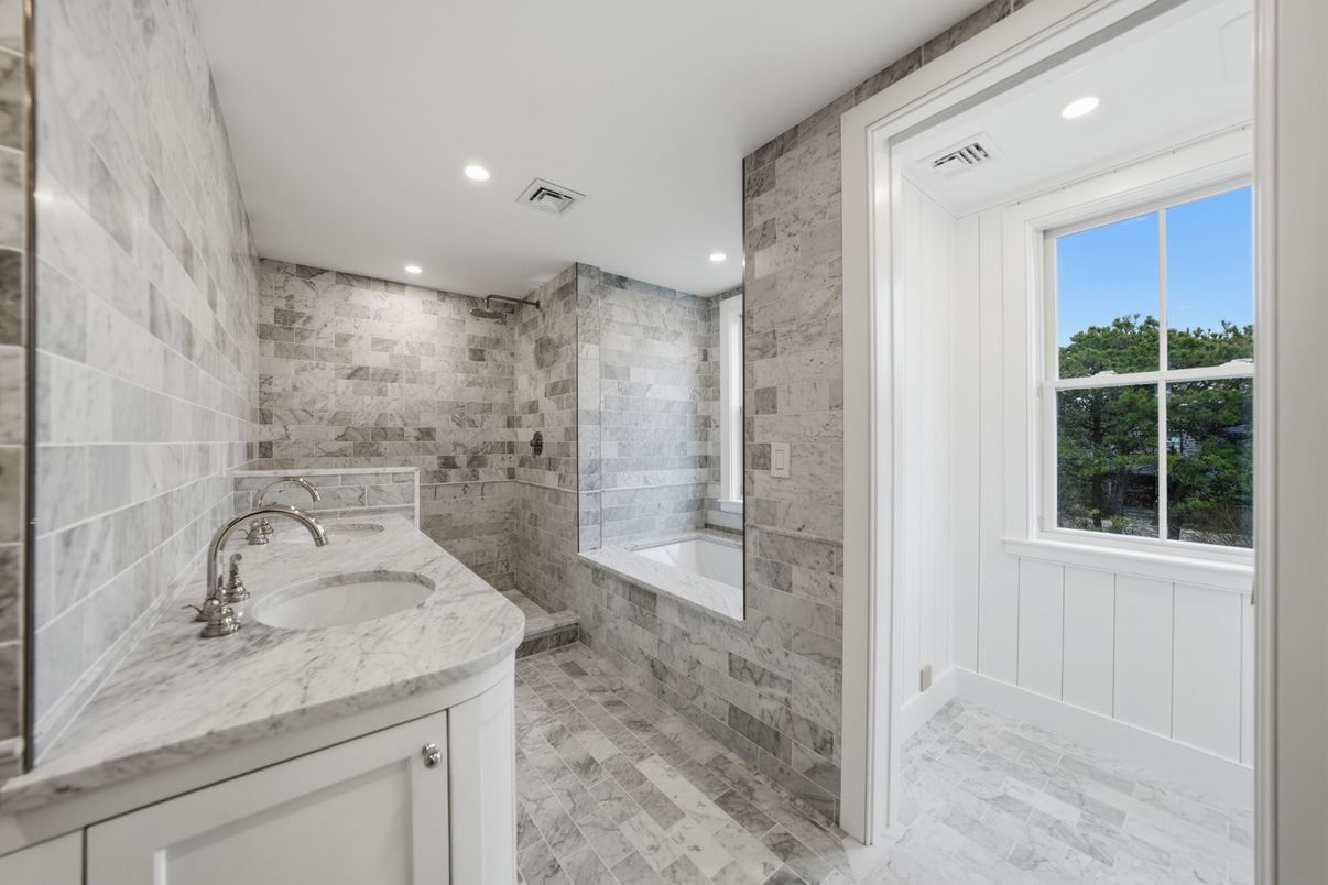 Bathroom, Dual Sink Vanities, Glass Shower, Interior, Recessed Lighting, Stone Walls