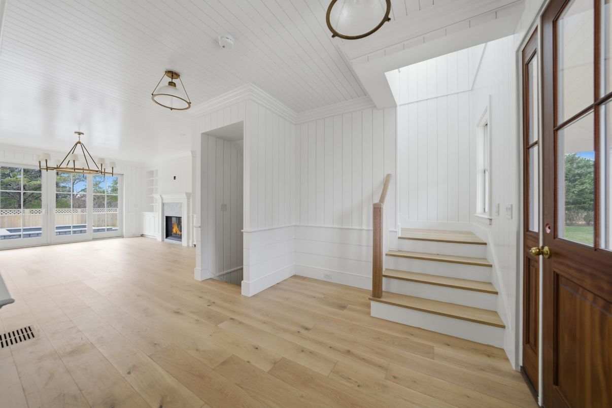 Empty room, Fireplace, Interior, Pendant Lights, Wood Texture Flooring