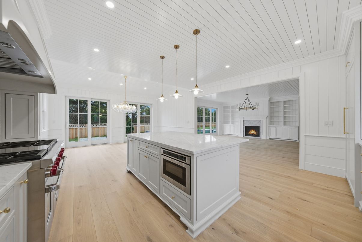 Fireplace, Interior, Kitchen, Pendant Lights, Recessed Lighting, Stainless Steel Appliances, Wood Texture Flooring