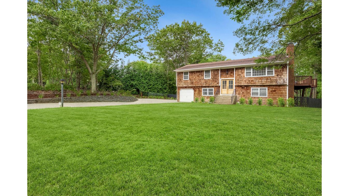 Attached, Backyard, Exterior, Facade, Brick Facade, Raised Ranch