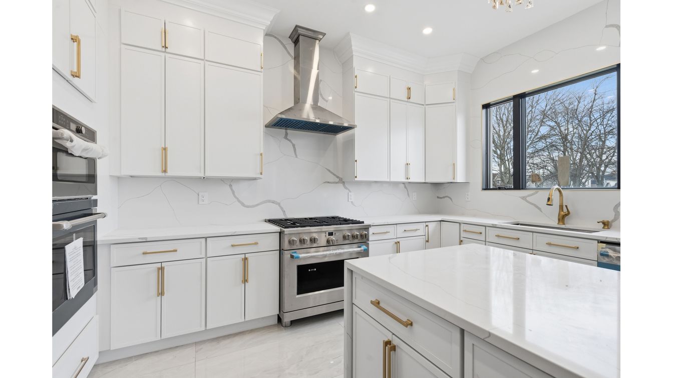 Interior, Kitchen, Marble, Marble Walls, Recessed Lighting, Stainless Steel Appliances