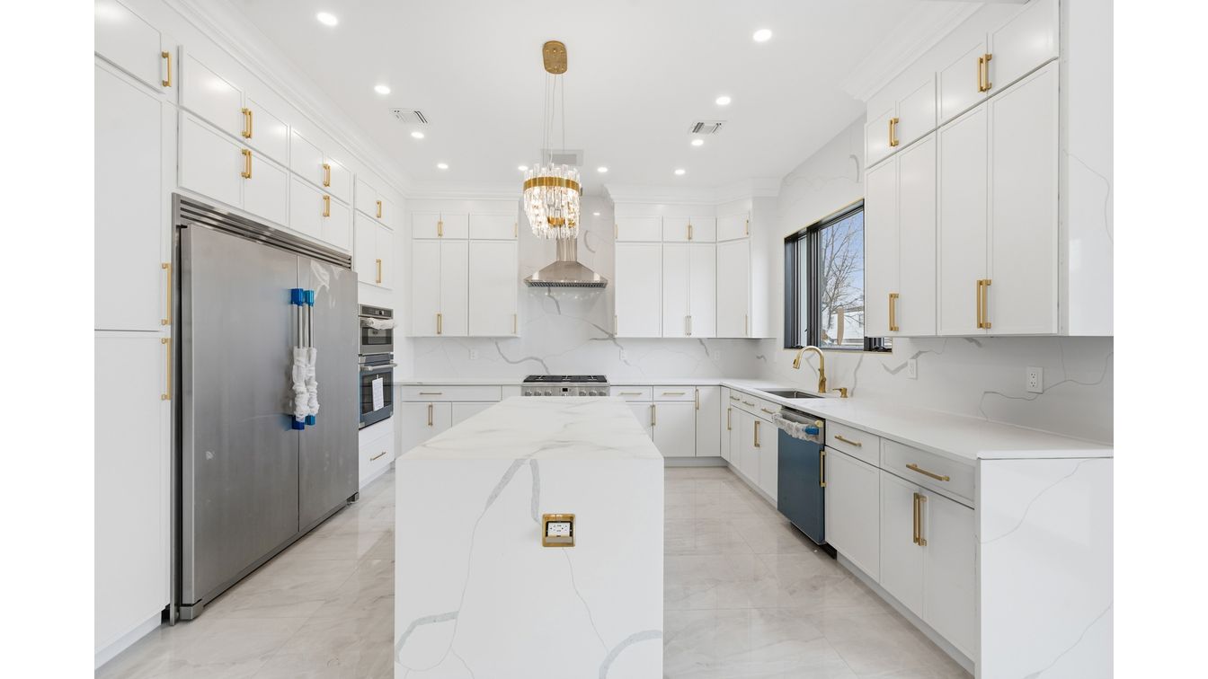 Interior, Kitchen, Marble, Marble Walls, Pendant Lights, Recessed Lighting, Stainless Steel Appliances