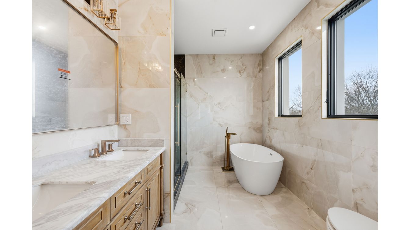 Bathroom, Dual Sink Vanities, Free Standing Baths, Interior, Marble, Marble Walls, Recessed Lighting