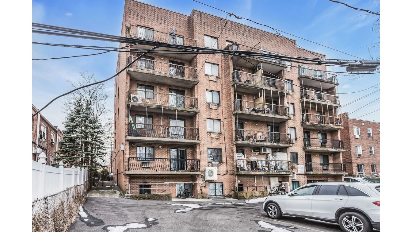 Exterior, Facade, Brick Facade, Condo Building