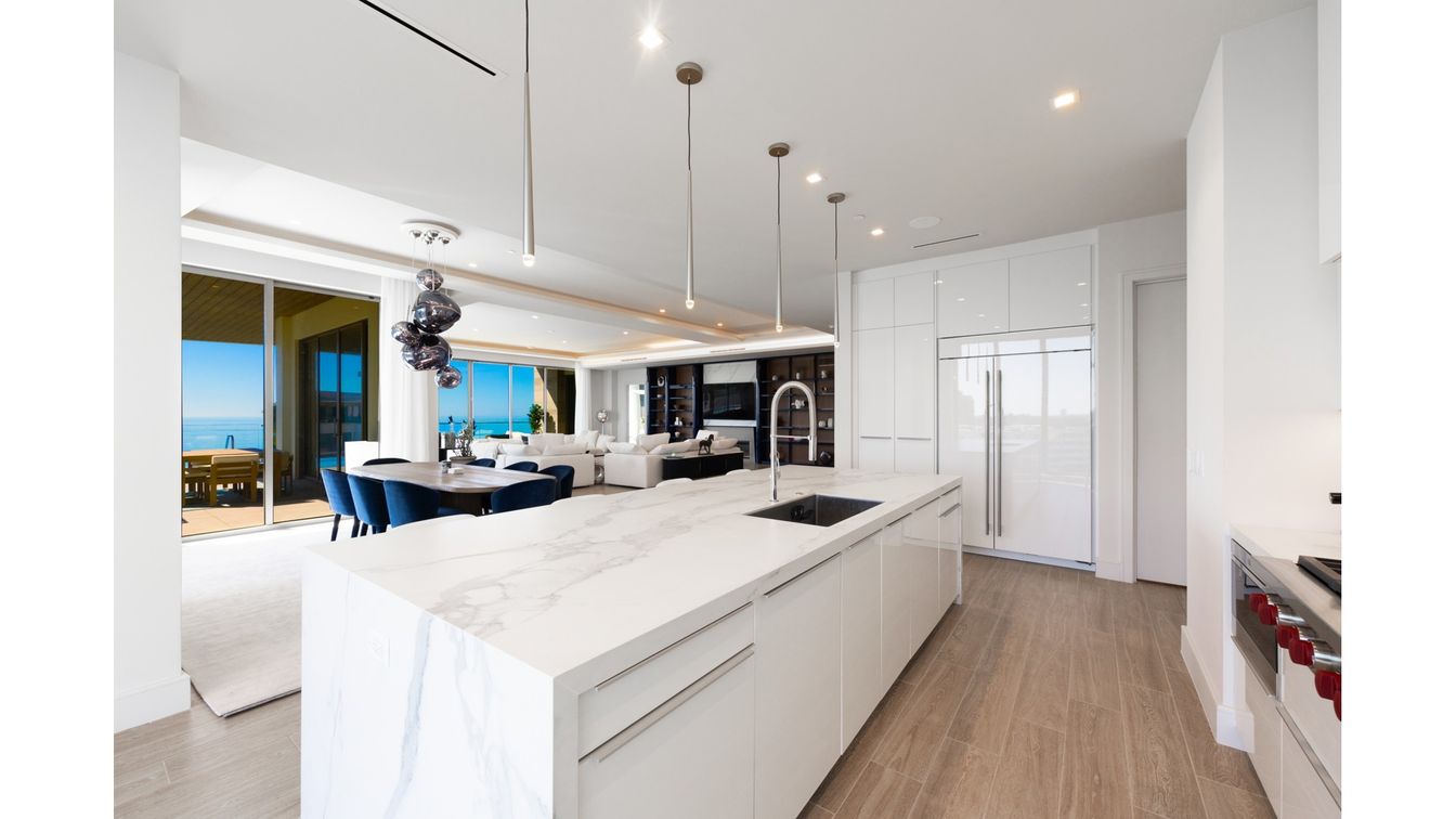 Dining room, Interior, Kitchen, Living room, Pendant Lights, Recessed Lighting, Stainless Steel Appliances, Water, Wood Texture Flooring