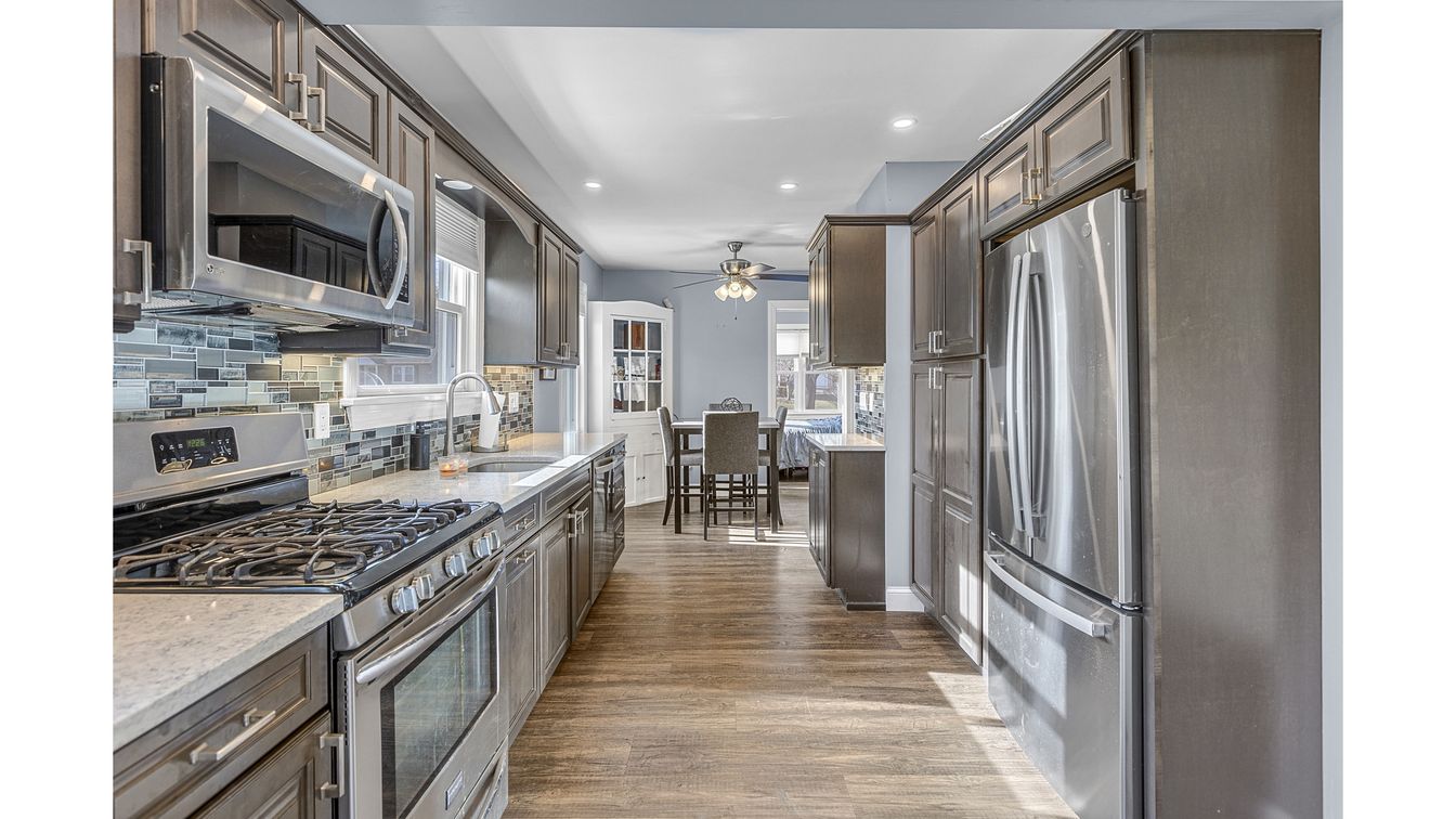 Dining room, Interior, Kitchen, Recessed Lighting, Stainless Steel Appliances, Wood Texture Flooring