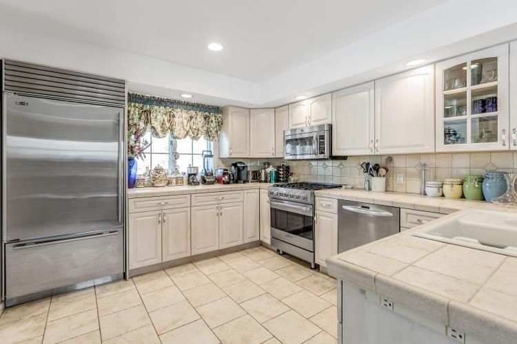 Interior, Kitchen, Recessed Lighting, Stainless Steel Appliances, Tile Countertops