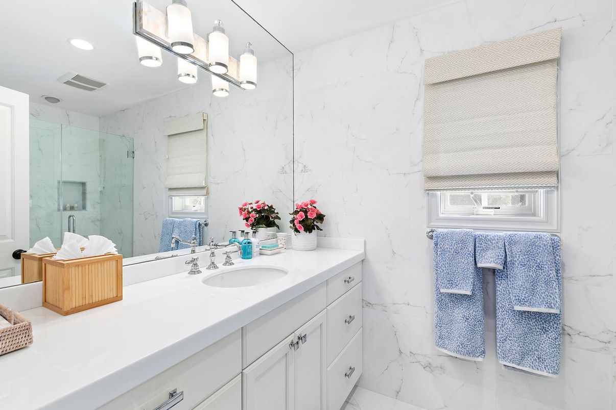 Bathroom, Dual Sink Vanities, Glass Shower, Interior, Marble, Marble Walls, Recessed Lighting