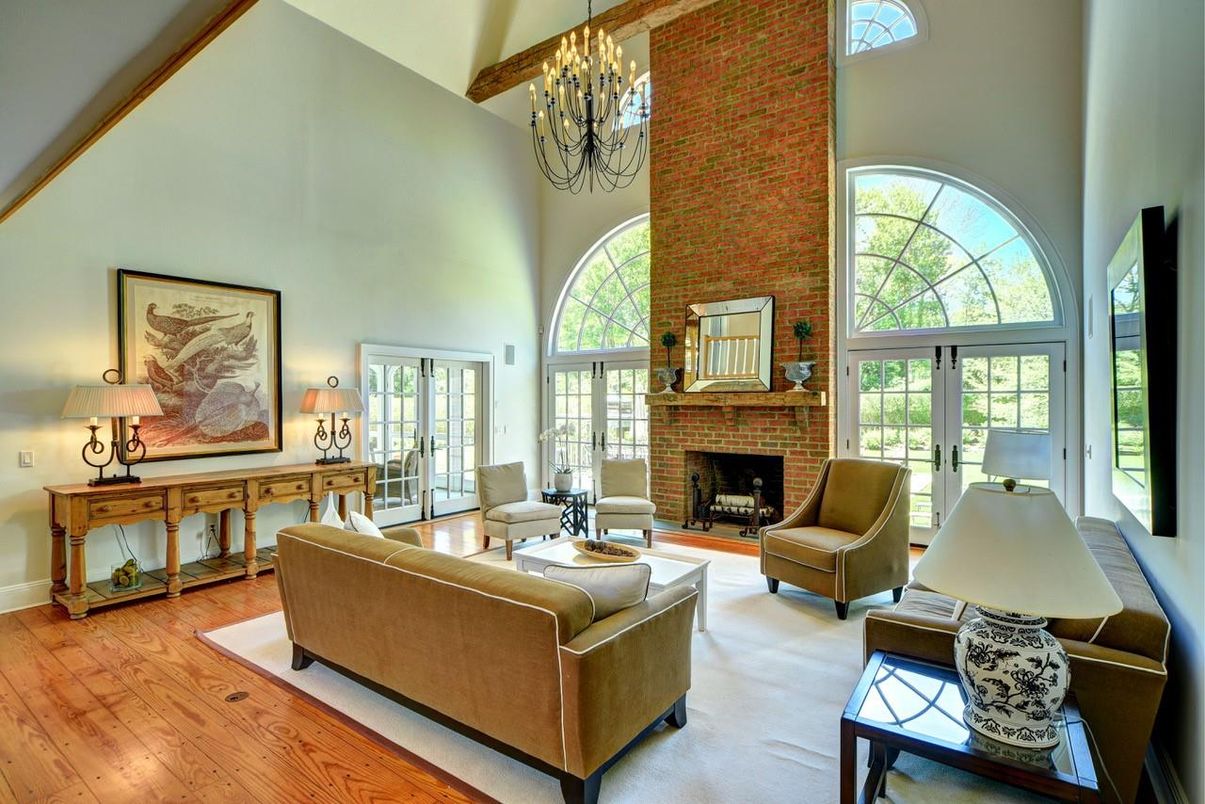 Chandelier, Fireplace, Interior, Living room, Stone Walls, Wooden Beams, Wood Texture Flooring