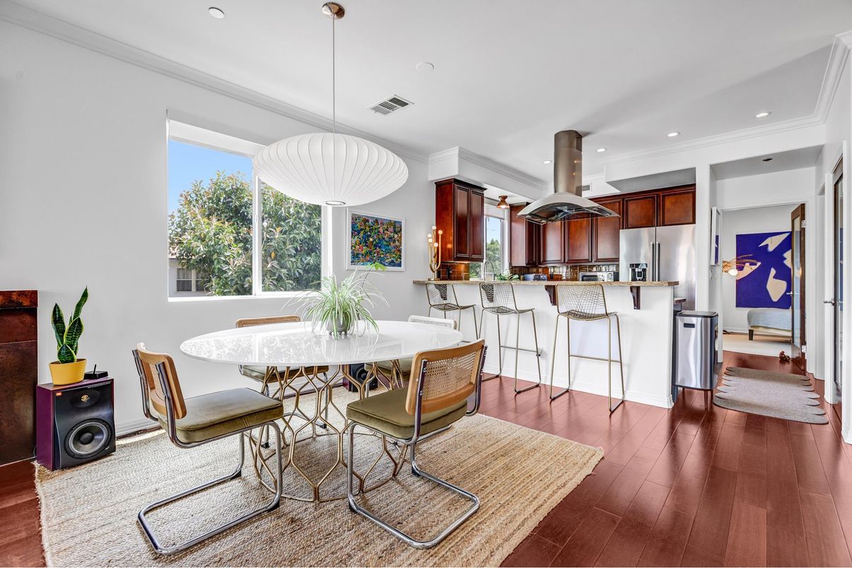 Dining room, Interior, Kitchen, Pendant Lights, Recessed Lighting, Stainless Steel Appliances, Wood Texture Flooring