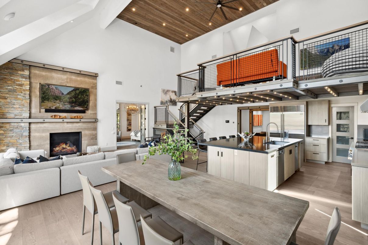 Dining room, Fireplace, Interior, Kitchen, Living room, Recessed Lighting, Stainless Steel Appliances, Stone Walls, Wooden Ceilings, Wood Texture Flooring