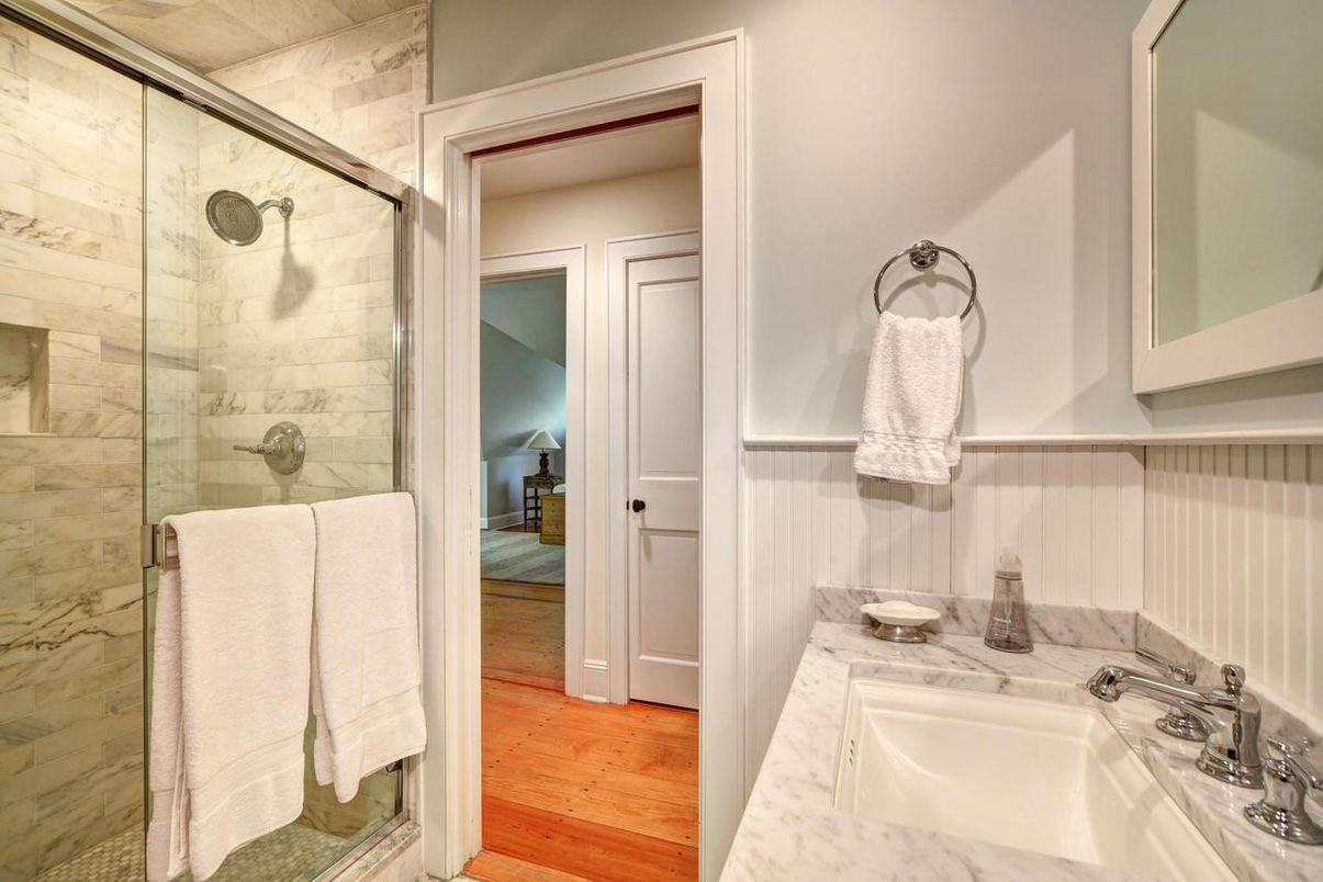 Bathroom, Glass Shower, Interior, Marble Walls, Wood Texture Flooring