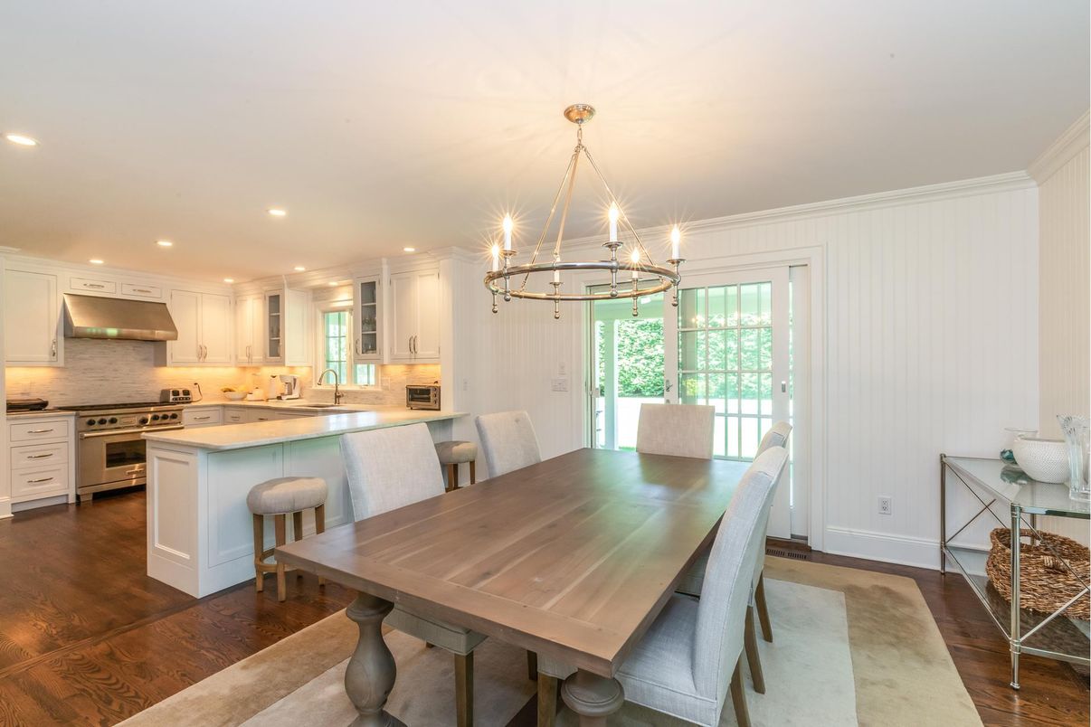 Chandelier, Dining room, Interior, Kitchen, Pendant Lights, Recessed Lighting, Stainless Steel Appliances, Wood Texture Flooring