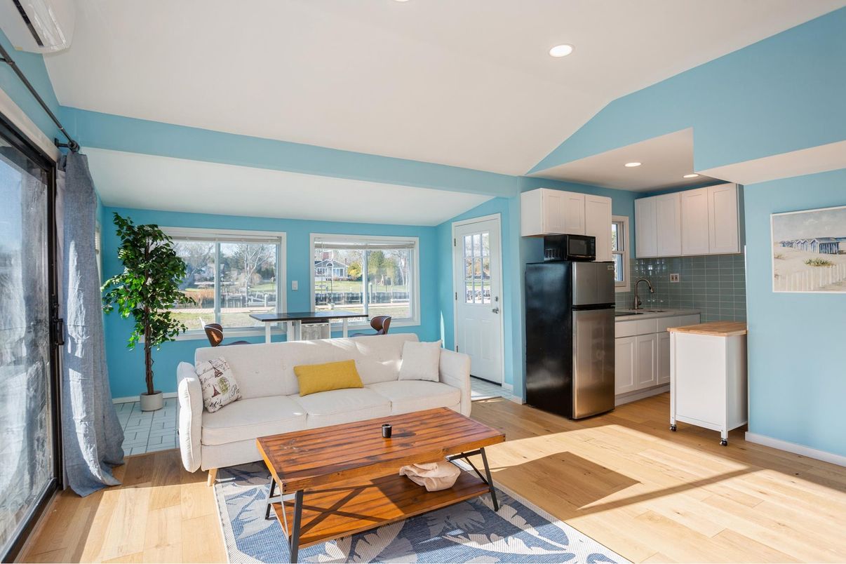 Dining room, Interior, Kitchen, Living room, Recessed Lighting, Stainless Steel Appliances, Wood Texture Flooring