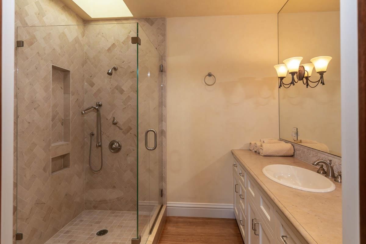 Bathroom, Dual Sink Vanities, Glass Shower, Interior, Wood Texture Flooring