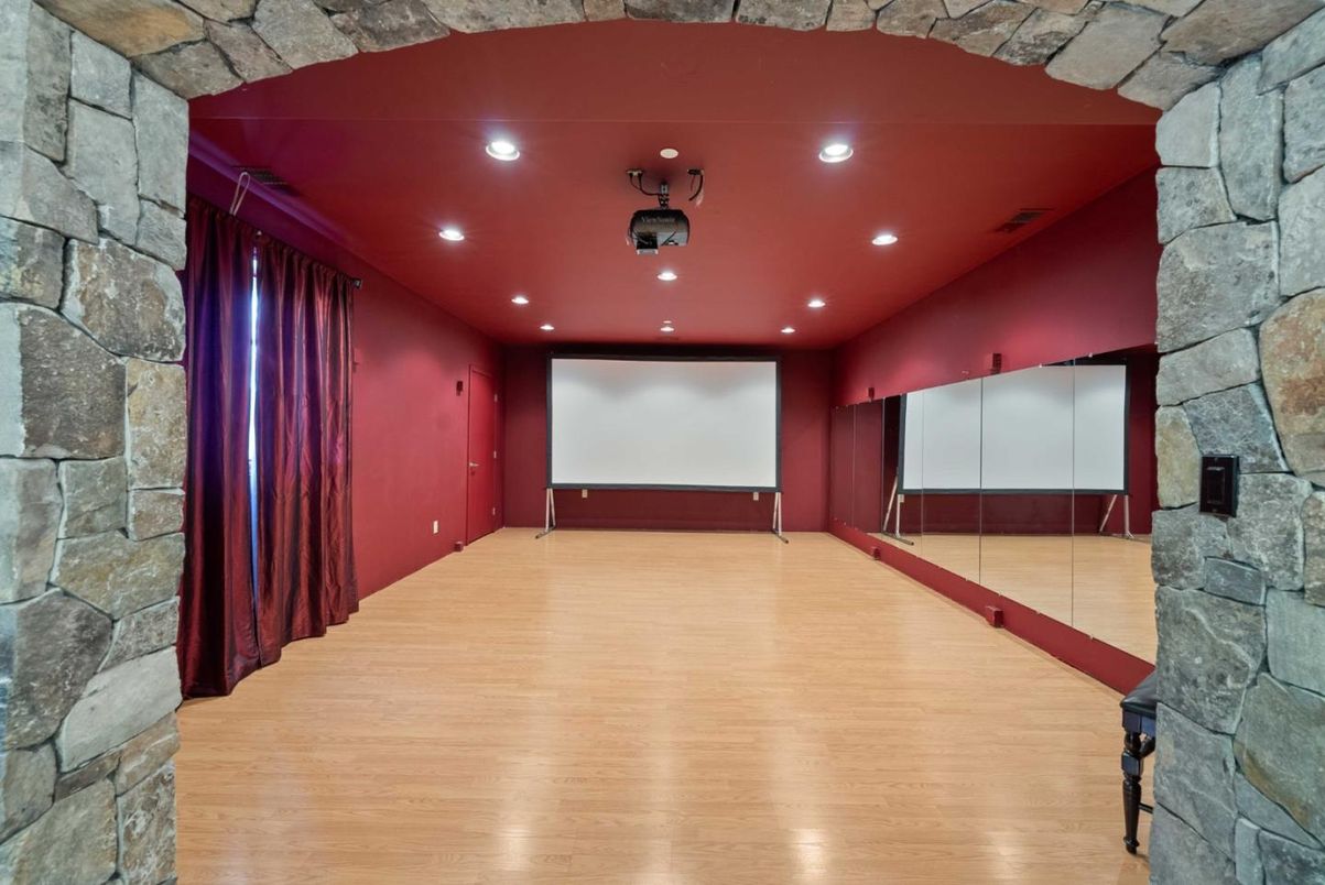 Empty room, Interior, Projection Screen, Recessed Lighting, Stone Walls, Wood Texture Flooring