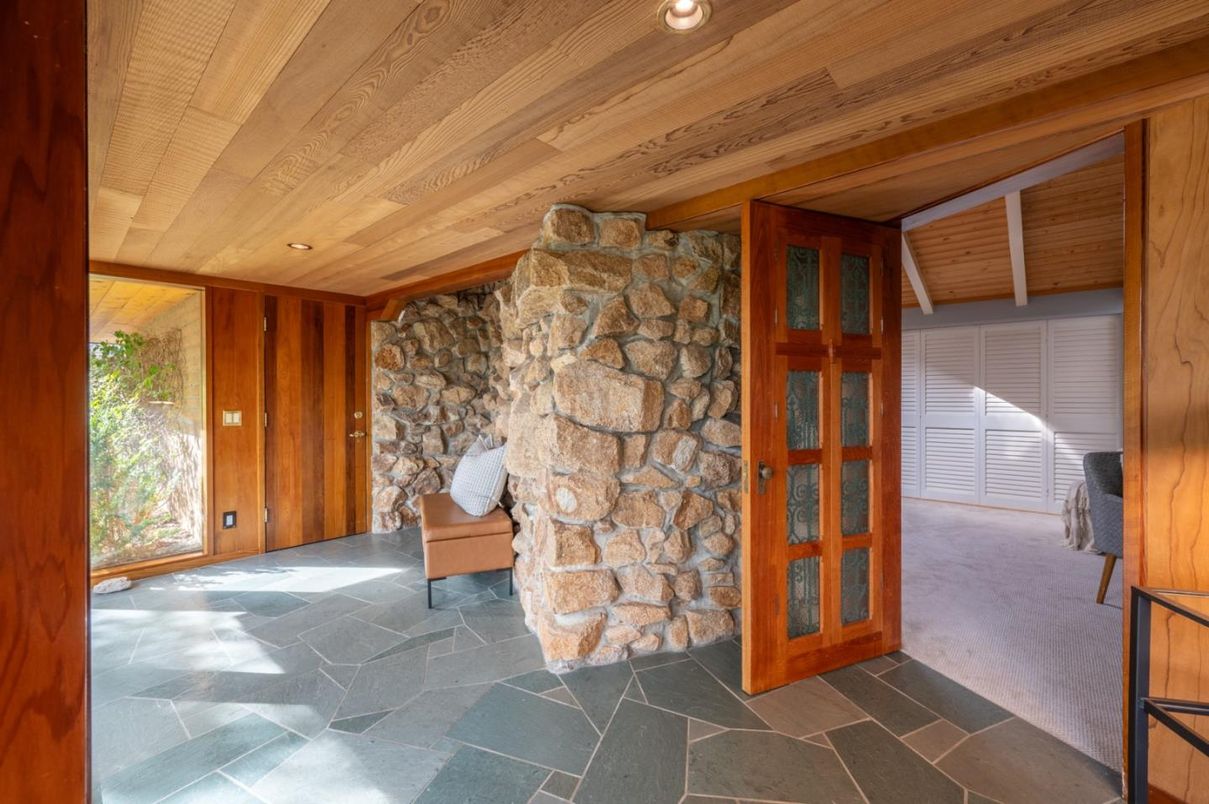 Empty room, Fireplace, Interior, Recessed Lighting, Stone Walls, Wooden Ceilings, Wooden Walls