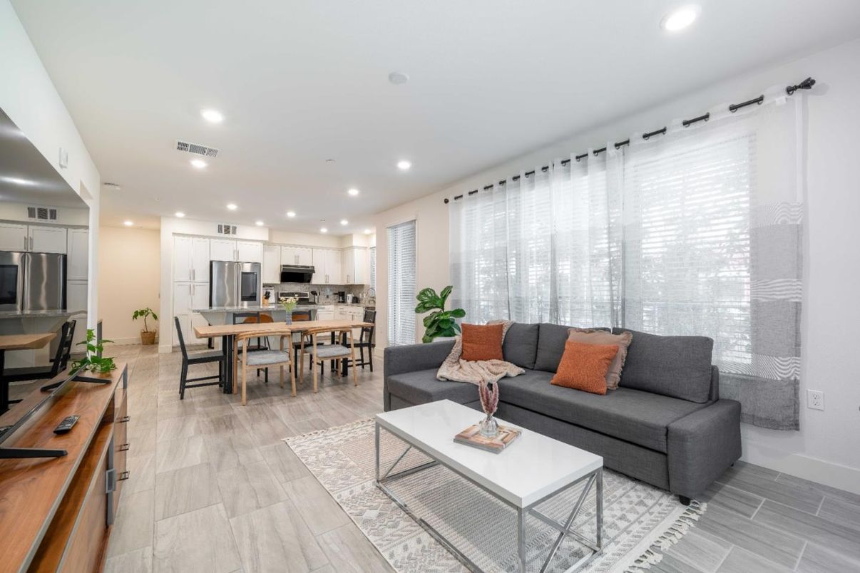Dining room, Interior, Kitchen, Living room, Recessed Lighting, Stainless Steel Appliances, Wood Texture Flooring